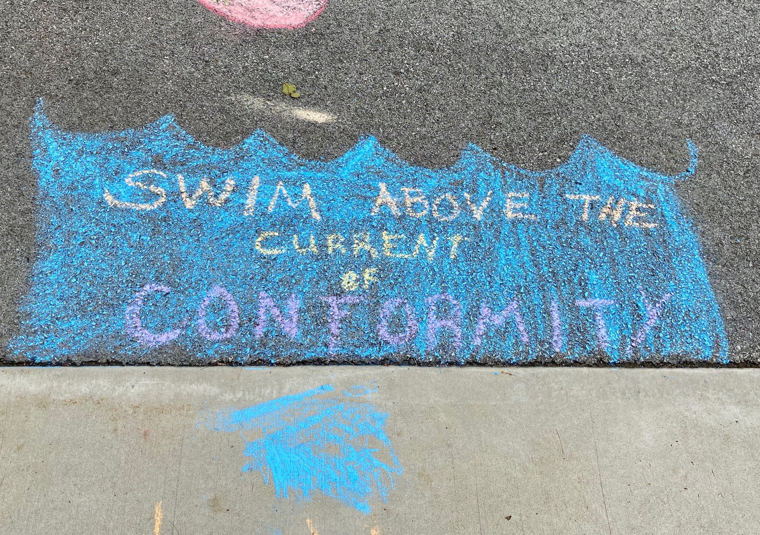 Image of water with the words "Swim Above the Current of Conformity"